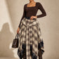WRAPPED IN PLAID SKIRT